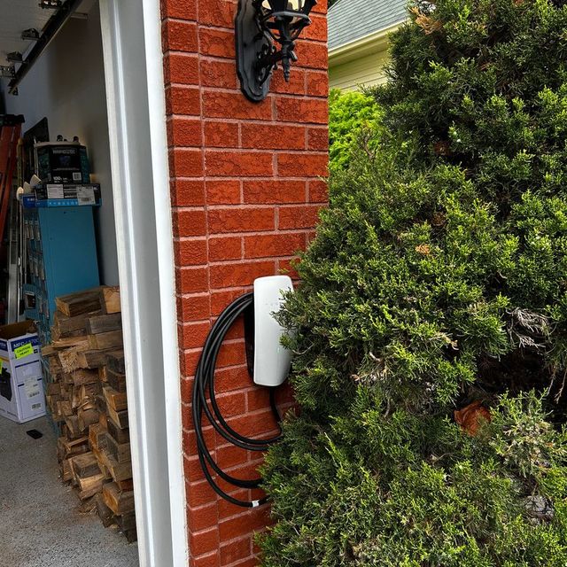 Borne de recharge — entrée résidentielle